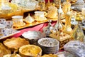 Metal bowls, dishes in market traditional Asian turkish bowls kitchenwear in silver and golden metal Royalty Free Stock Photo