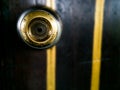 Metal brass door knob on the wooden door Royalty Free Stock Photo