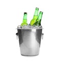 Metal bucket with bottles of beer and ice cubes isolated Royalty Free Stock Photo