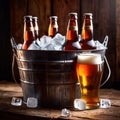 Metal bucket with cold bottles of beer and ice