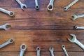 Metal bunch wrench  tools lying on dark wooden background Royalty Free Stock Photo