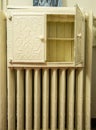 Metal cabinet on the radiator.