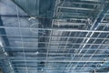 Metal cable conduit flex pipe at ceiling Royalty Free Stock Photo