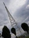 Metal cell phone tower against an overcast sky Royalty Free Stock Photo