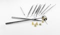 Metal ceramic dentures with dentist tools Royalty Free Stock Photo
