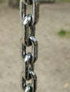 Metal chain close up background. Links Of A Heavy Silver iron metal chain Close-Up View. strength and power concept