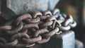 Metal chain entwining the anvil Royalty Free Stock Photo