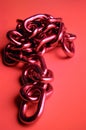 Metal chain with a red background Royalty Free Stock Photo