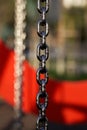 Metal chain with red background Royalty Free Stock Photo