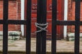 Metal chain on the red gate
