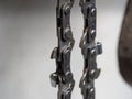 Metal chainsaw chain with sharp teeth close-up