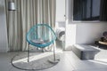 Metal chair, living room interior. modern armchair near panoramic windows. Panoramic windows. Template. Royalty Free Stock Photo