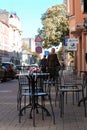 Metal chairs of outdoor caffe in city