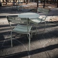 Metal Chairs and Round Table in Bosque Park in Addison TX Royalty Free Stock Photo