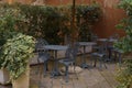 View of the chairs against the background of an old tenement house Royalty Free Stock Photo