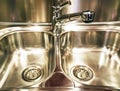 Metal chromeplated kitchen sink Royalty Free Stock Photo