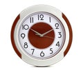 A metal clock isolated on the white background. The clock has a red center