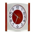 A metal clock isolated on the white background. The clock has a red center