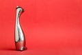 Metal Coated Cat Shape figurine on Red Background Royalty Free Stock Photo