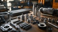 Metal components and tools neatly arranged on a wooden workbench for precision engineering tasks Royalty Free Stock Photo