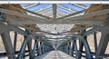 Metal-concrete bridge with a glass roof