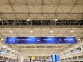 Banner of safe tourism under metal ceiling construction in Antalya airport Turkey Royalty Free Stock Photo
