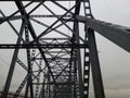 Metal construction of the railway bridge with the rising middle part for the passage of ships