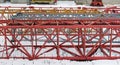 Metal constructions of crane lie on the snow Royalty Free Stock Photo