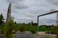 From metal constructions to climbing plants and vines is a sitting terrace of rough stone paving chipped cubes. metal gray furnitu Royalty Free Stock Photo