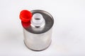 Metal container for chemicals on a white table. A tin plate with a plastic stopper Royalty Free Stock Photo