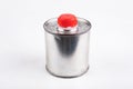 Metal container for chemicals on a white table. A tin plate with a plastic stopper Royalty Free Stock Photo