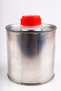 Metal container for chemicals on a white table. A tin plate with a plastic stopper Royalty Free Stock Photo