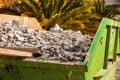 Metal container with construction waste rubble Royalty Free Stock Photo