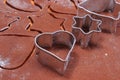 Metal cookie cutters and dough for gingerbread Royalty Free Stock Photo
