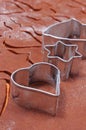 Metal cookie cutters and dough for gingerbread Royalty Free Stock Photo