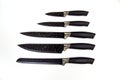 Metal cooking peeler knives with antibacterial coating black handle isolated on white background. Kitchen utensils, edged weapons