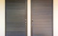 Metal corrugated slide door with the handle Royalty Free Stock Photo