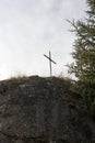 A metal cross on the hilltop. Conceptual.