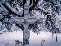 Metal Crucifix in the snow Royalty Free Stock Photo