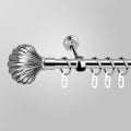 Metal curtain cornice and finials on the gray background. Royalty Free Stock Photo