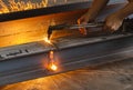 Metal cutter, steel cutting with acetylene torch.