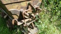 Metal details of an old rusty carts for transporting materials from the mine. Schilpario, Bergamo, Italy Royalty Free Stock Photo