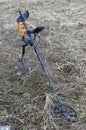 Metal detector in the field ready to work