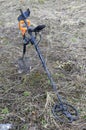 Metal detector in the field ready to work