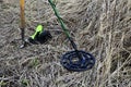 Metal detector in the field ready to work