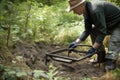 metal detector frame in action, with the person searching for hidden treasures