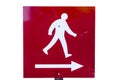 Metal directional sign, with white painted figure walking, a