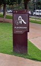 Metal display totem on public park indicating Playground Area, Ribeirao Preto, Brazil