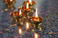 Metal Diyas lit up for the Indian Hindu festival of Diwal