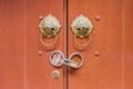 Metal door knockers and lock Royalty Free Stock Photo